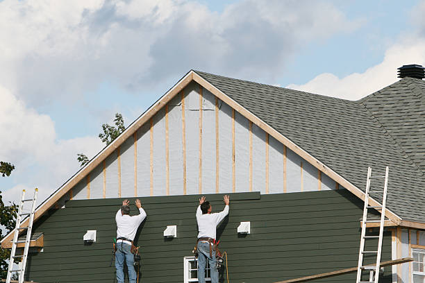 Professional Siding technician working in Graysville, OH